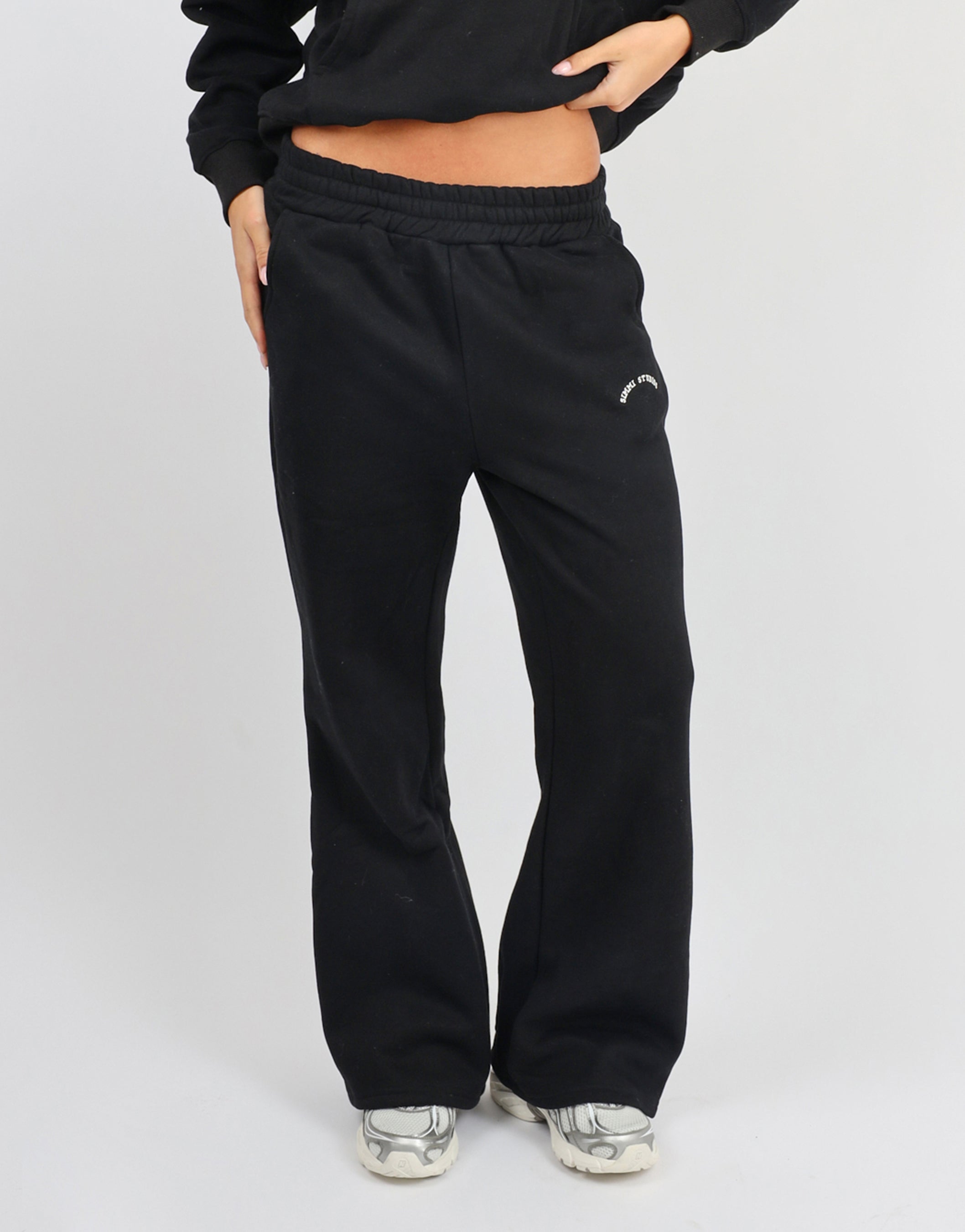 Colby Simmi Studios Varsity Flared Joggers in Black